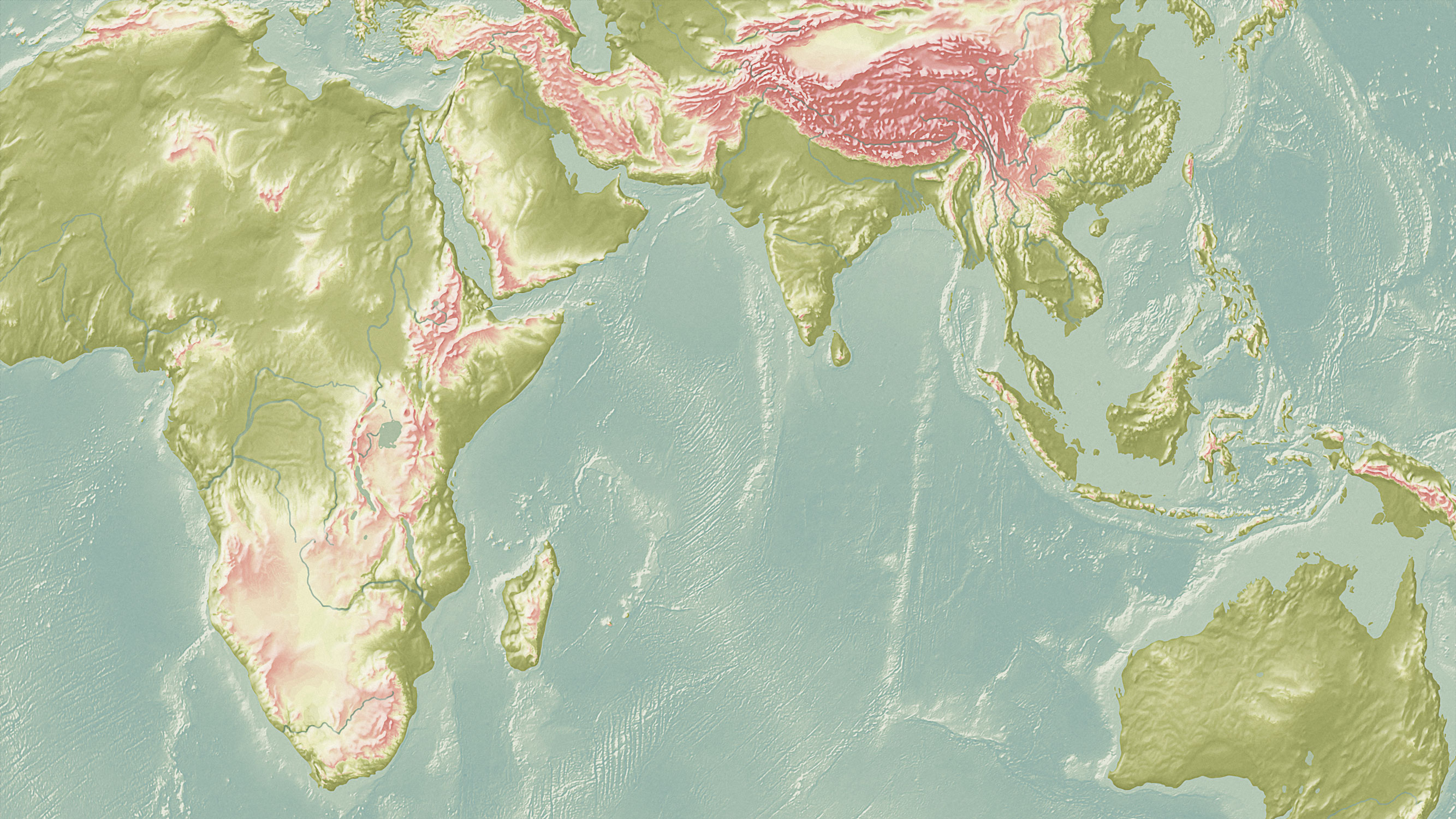 Shaded relief map of Africa, Asia, and Australia, symbolizing Staridas Geography’s global perspective and expertise in geographic visualization