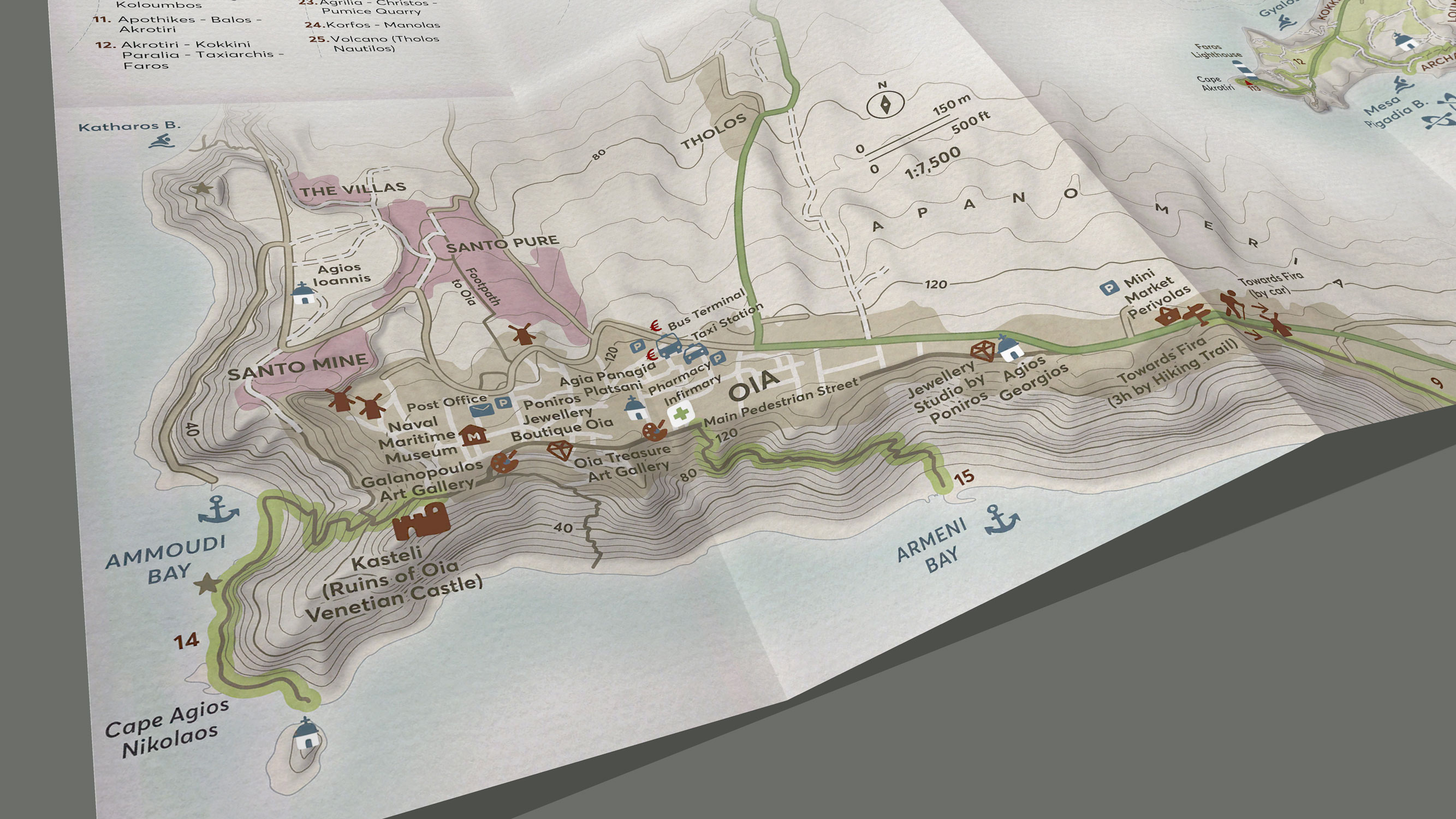 Detail of the paper map showing Oia village and the three Santo Collection properties on its outskirts.