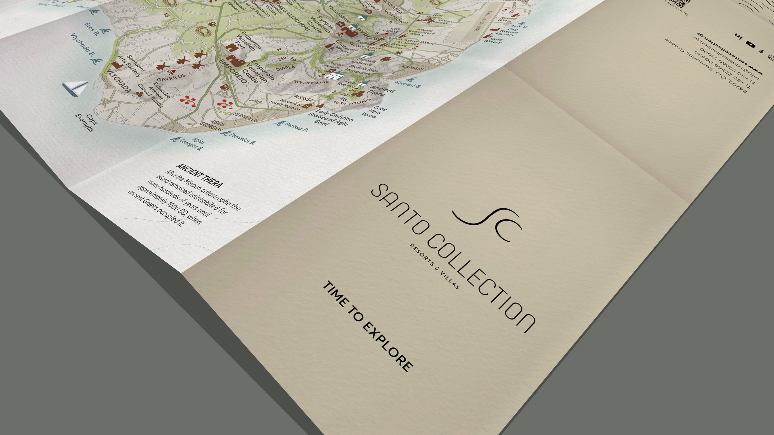 Folded paper map cover panel showing the Santo Collection Resorts & Villas logo and tagline.